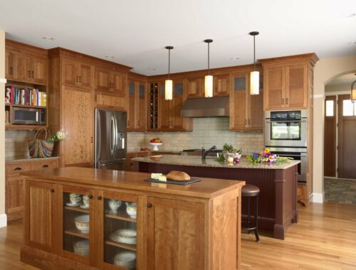 Kitchen with cherry cabinets and two islands