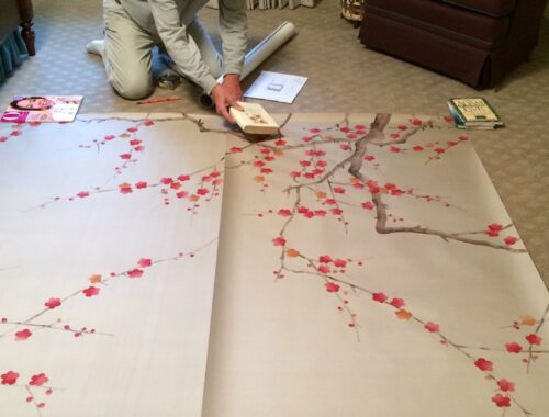 Hand-painted paper by De Gournay for the wall cherry blossoms