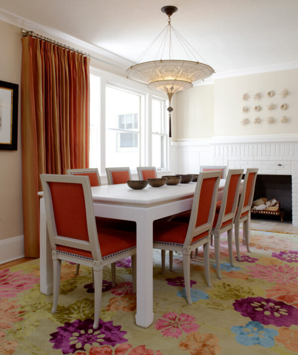 Dining room with whimsical touches in an Edina home designed by LiLu Interiors